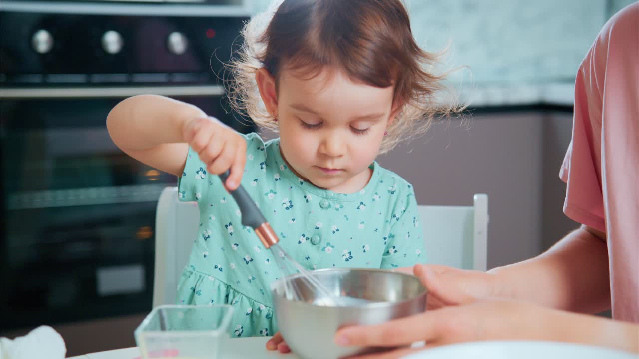 Captivating Moments of a Young Child Engaged in Cooking: A Sweet Experience of Mixing Ingredients and Learning in the Kitchen