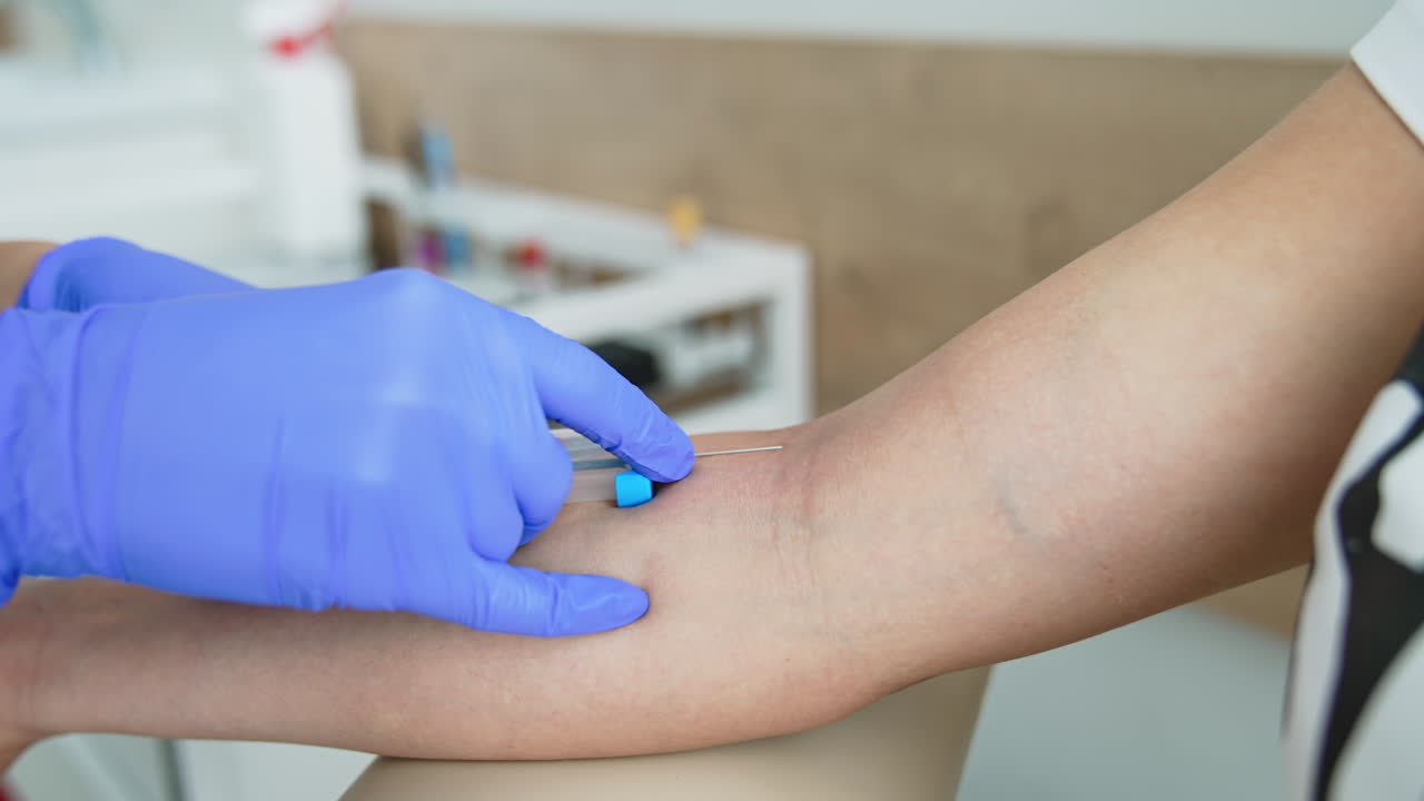 Global vaccination campaign. Woman getting intravenous meds injection at clinic. Professional medicare concept. Epidemic diseases prevention. Close-up.
