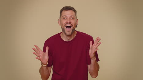 excited amazed man shocked by sudden victory game winning, lottery goal achievemen, good news, wow