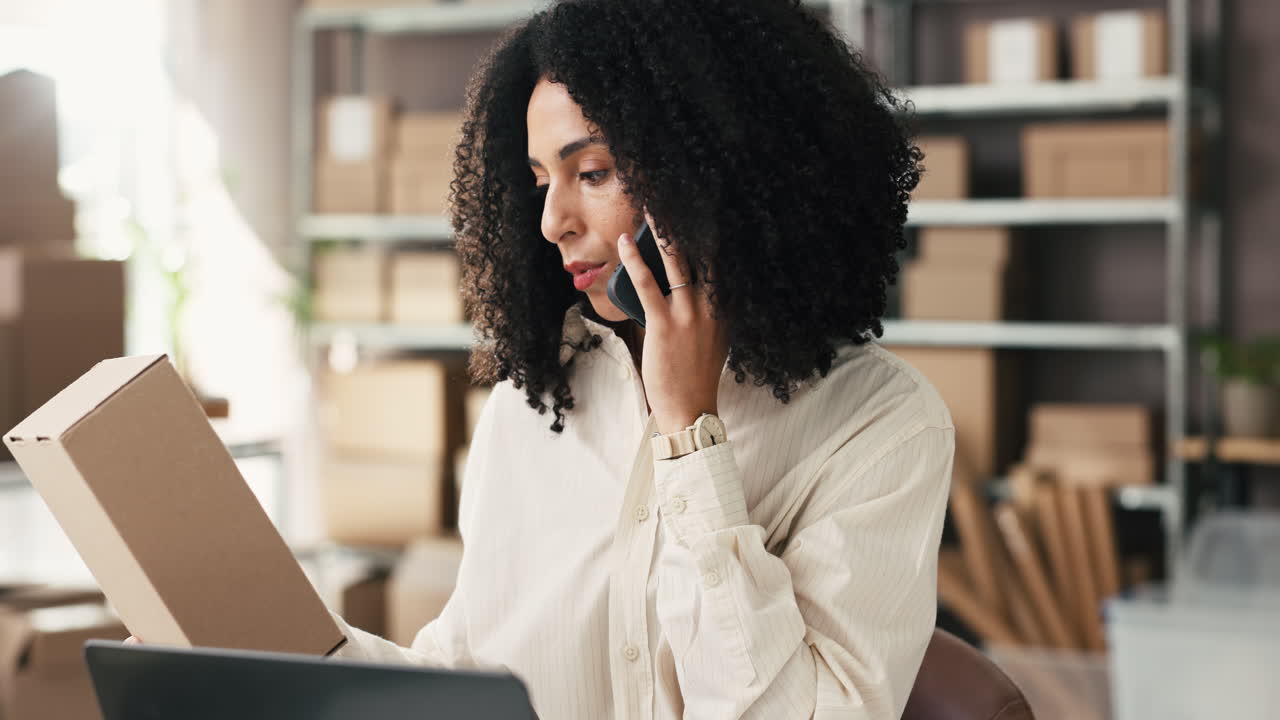 Businesswoman on Phone Call While Checking Order Details