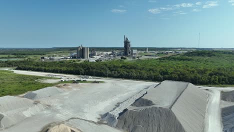 work site with power plant in the background