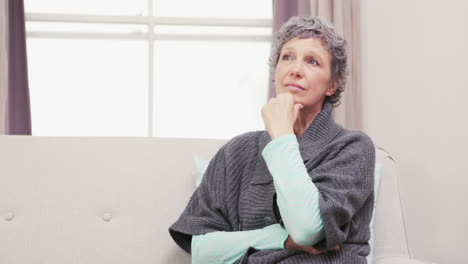 Thoughtful-woman-thinking-with-hand-on-chin