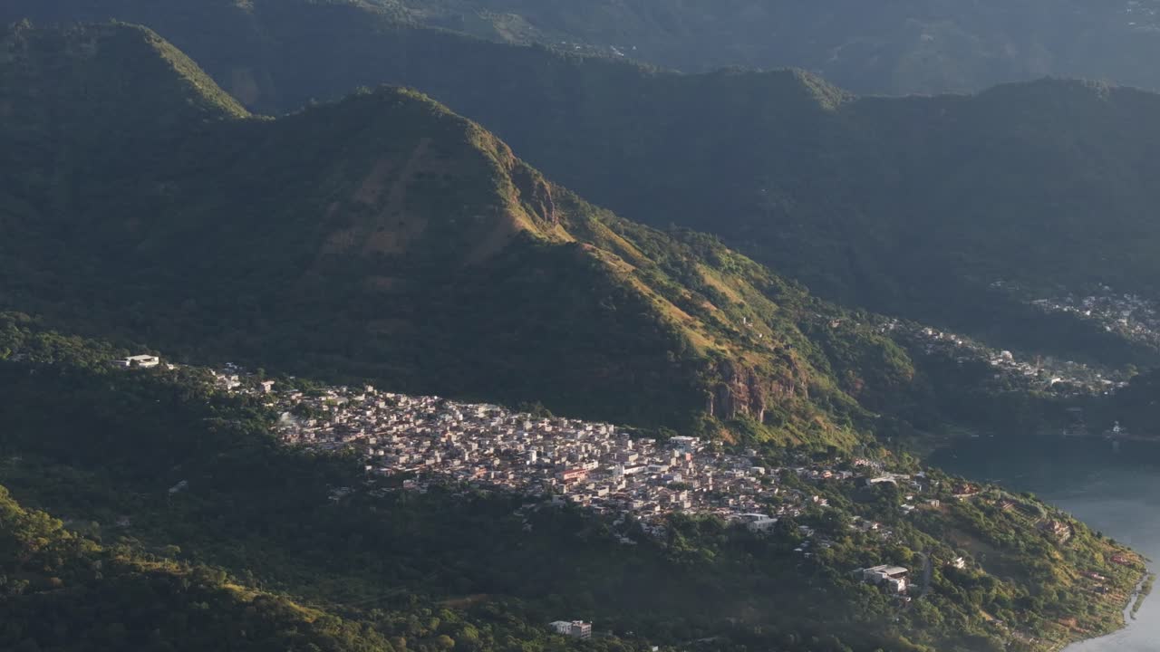 Aerial view of captivating sunrise in San Marcos La Laguna, Guatemala, overlooking the cultural heritage of Guatemala