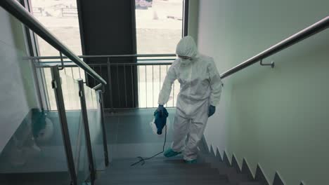 tracking video of disinfecting the staircase.