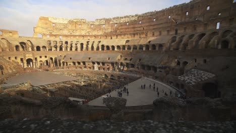 tourists inside the colosseum