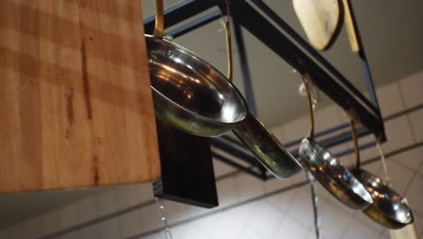 hanging pots and pans in a kitchen