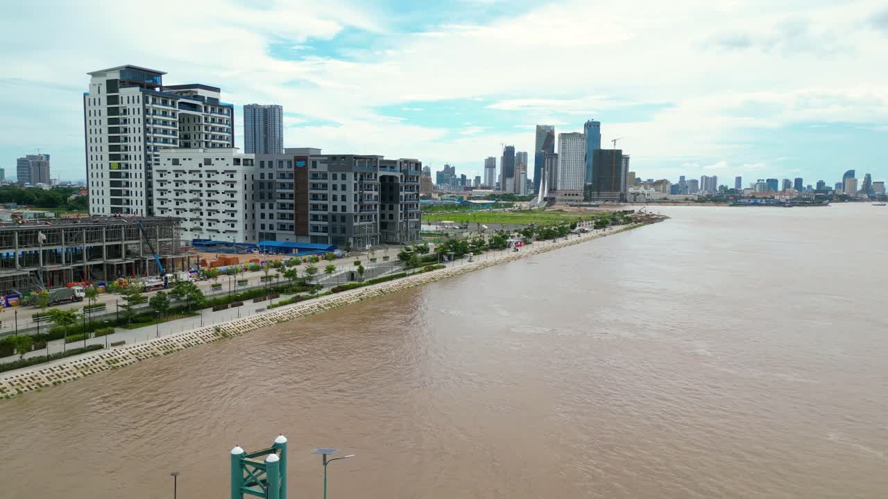 Riverside Cityscape with Floating Dock and Urban Skyline