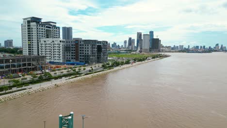 riverside cityscape with floating dock and urban skyline