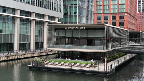 hawksmoor restaurant on a floating platform in a modern city setting