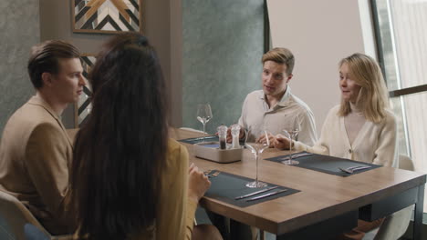 friends enjoying a meal in a restaurant