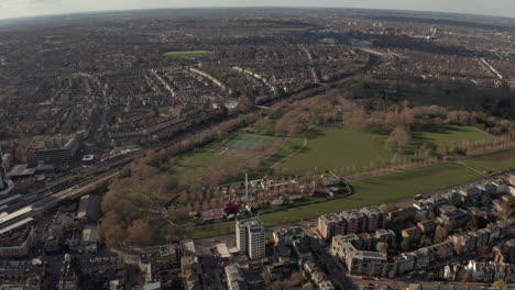 Circling-aerial-shot-of-Finsbury-park-London