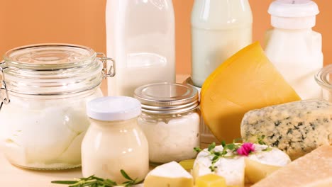 various dairy items displayed on a wooden surface