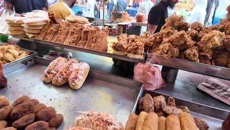 street food market with fried chicken and sandwiches