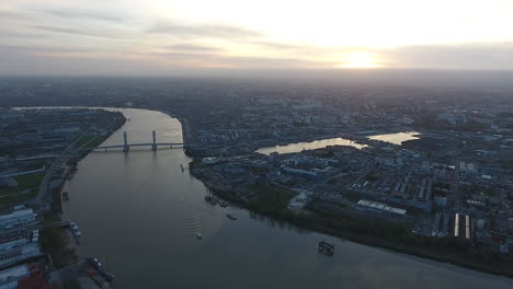 Bordeaux-aerial-cityscape-sunset-time-river-la-Garonne,-bridge-urban-area.