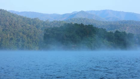 foggy river with mountains in chiang mai, thailand