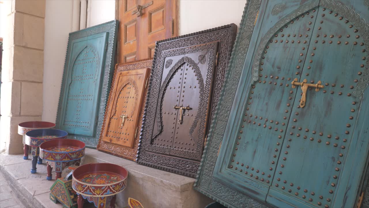Antique and traditional wooden doors displayed at art center