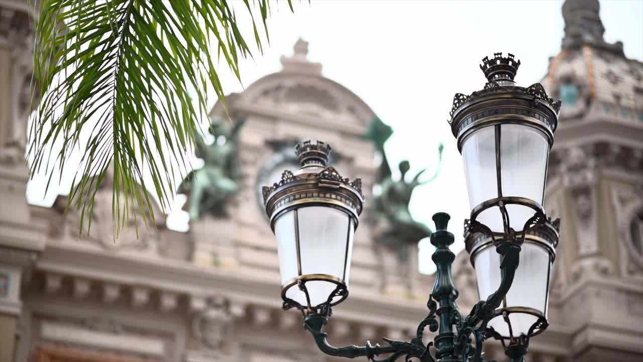 Casino of Monte Carlo building with big metallic lanterns in Monaco, close up view