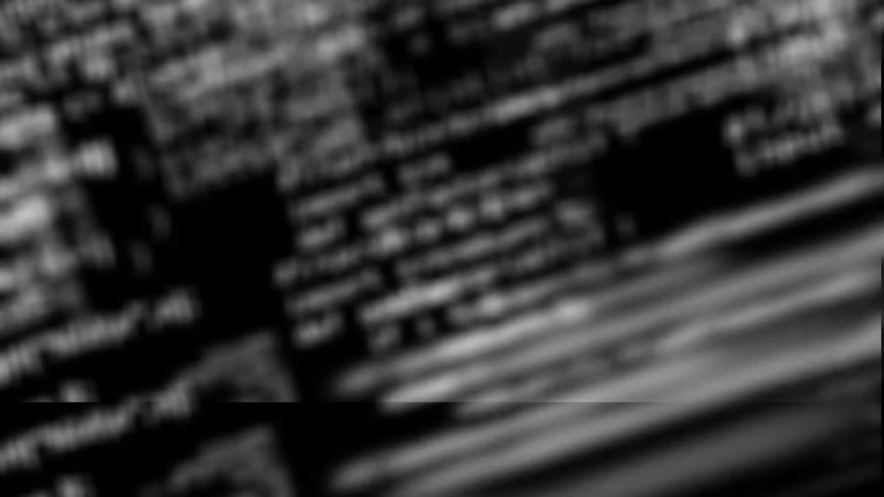 Animation of blur effect over data processing against black background