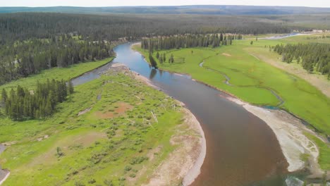 aerial view of the yellowstone river, glimpse into the heart of a natural masterpiece, where the river's journey weaves through a tapestry of awe-inspiring vistas