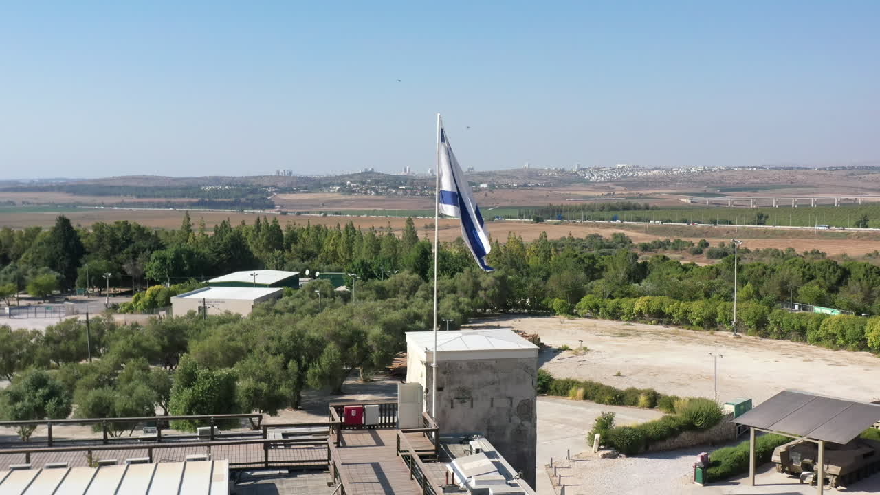Latrun Armored Corps Memorial Building and Israel flag, Drone View