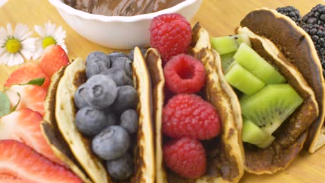 classic american pancakes with fresh fruits. summer homemade breakfast.