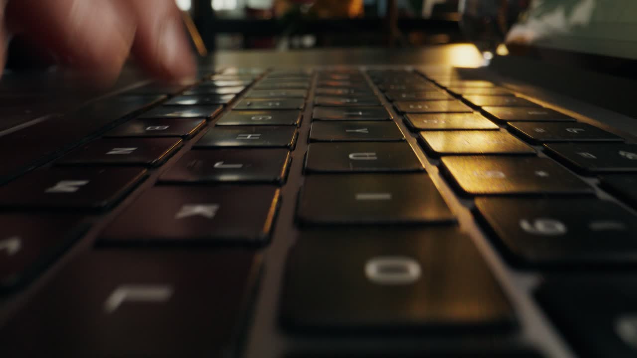 Person Typing on a Laptop