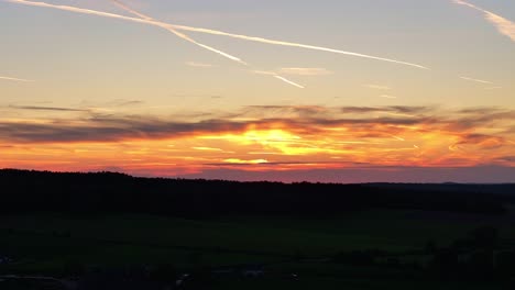 Darkness-has-enveloped-the-ground,-skyline-of-bright-vibrant-colours