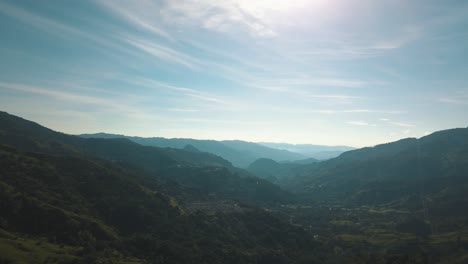 Drone-aerial-wide-landscape-view-of-mountains-and-green-forest-in-colombia-near-Guatape-area