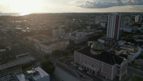 aerial drone fly above the amazon theatre manaus brazil cityscape during daylight, skyline and town, touristic landscape