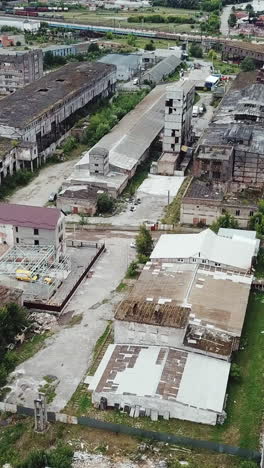 aerial view of an abandoned industrial plant. factory ruins.. vertical video