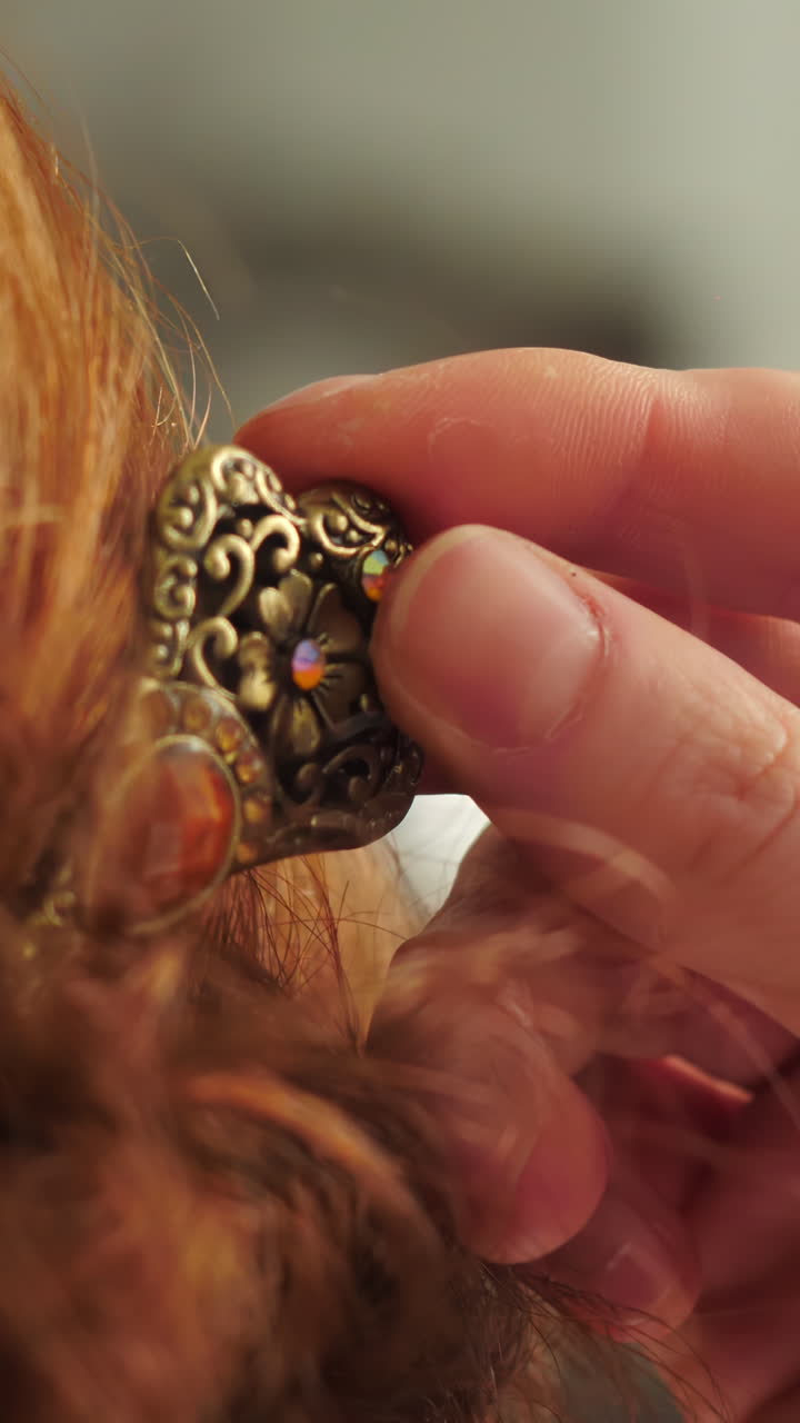 Woman with ornate gold hair clip