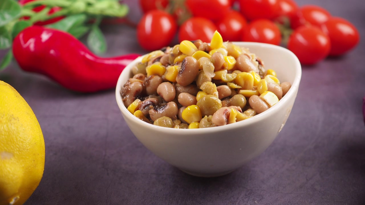 Fresh Bean and Corn Salad in a White Bowl with Vegetables