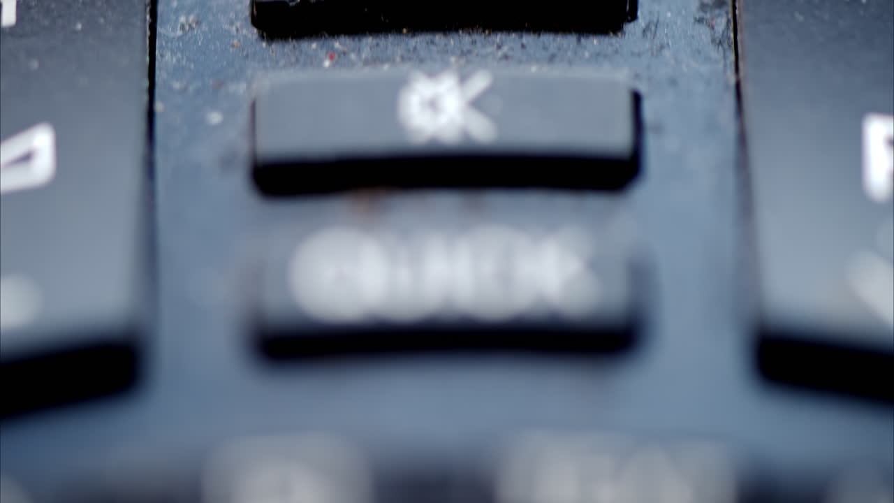 Old dirty tv remote control macro close up