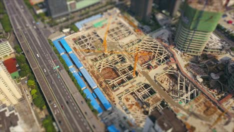 day time shanghai city traffic road side construction aerial top view 4k tilt shift china