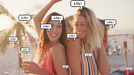 Animation-of-speech-bubbles-with-lol-text-over-female-friends-dancing-on-beach