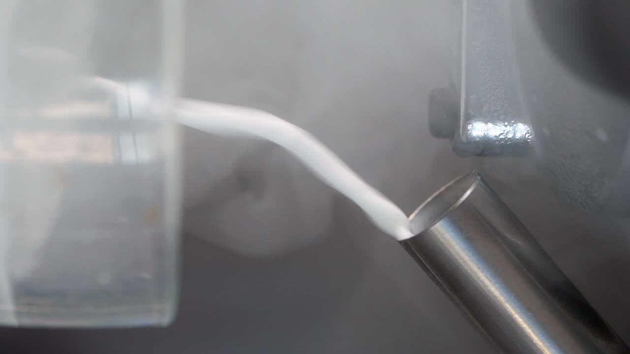 Pouring Liquid Nitrogen into a Metal Tube