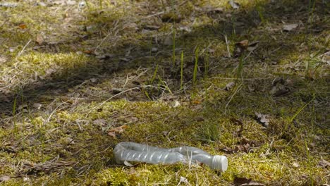 the white plastic bottle stumped on the ground in estonia