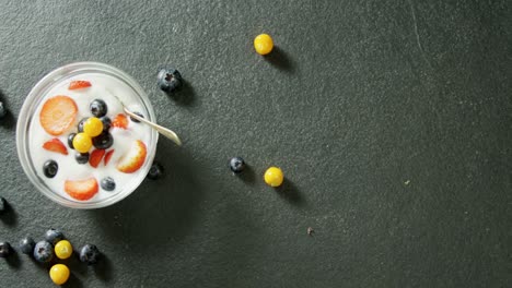 Blueberries-and-strawberries-with-milk-in-bowl-4k