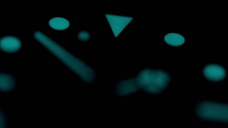 Close up of a watch with rotating hands