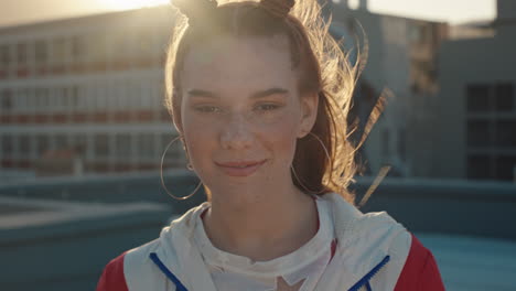 portrait-happy-woman-smiling-beautiful-teenage-girl-with-red-hair-looking-happy-with-wind-blowing-hair-enjoying-positive-self-image-in-city-at-sunset