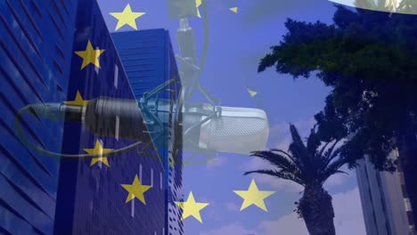 Animación-De-La-Bandera-De-La-Unión-Europea-Sobre-Micrófonos-Y-Edificios-De-Gran-Altura-En-Una-Ciudad-Moderna