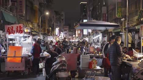 authentic local market experience at night on xichang street, taipei: vendors, shoppers, and traditional offerings