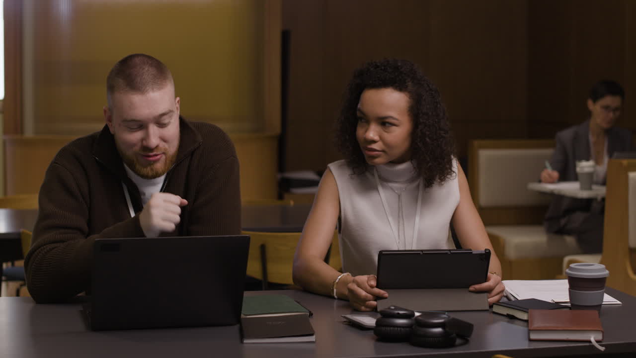 People working together in a cafe
