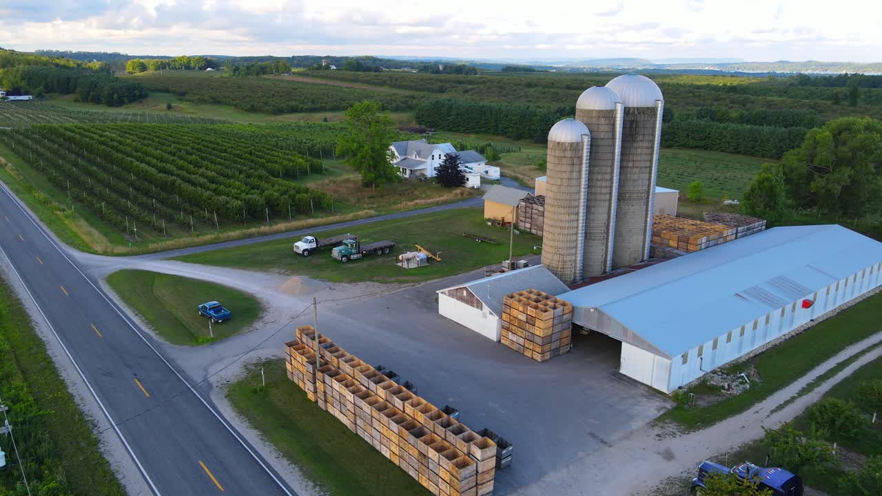 Traditional American farm in green countryside, aerial drone view