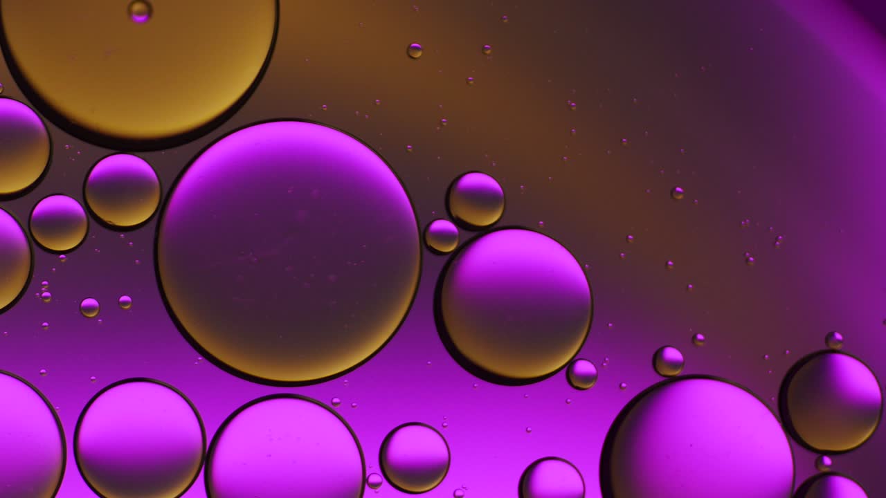 Colorful artistic of oil drop floating on the water.