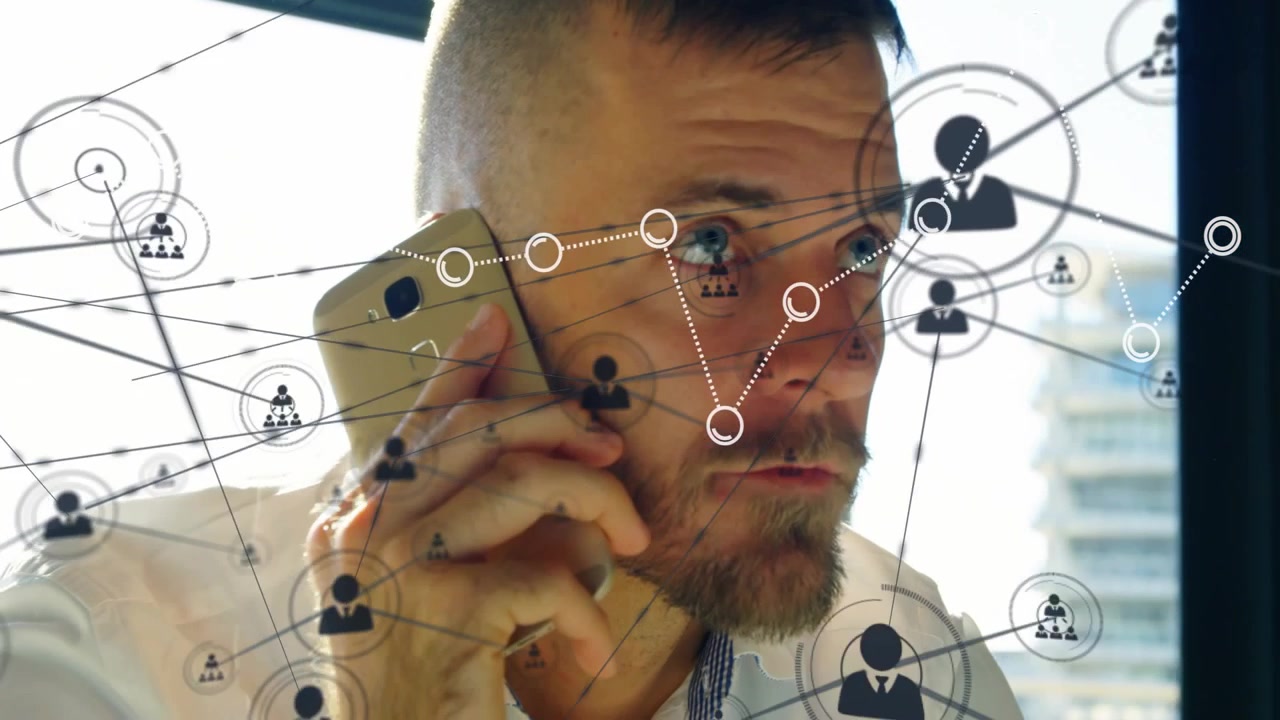 Man holding phone receiving call, tracking animated network nodes crossing face for business
