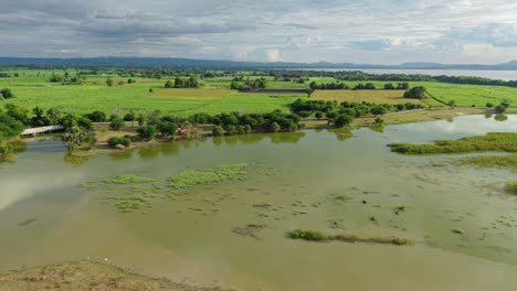 aerial view of rural landscape with river and farmland