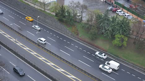 highway traffic in a city on a rainy day