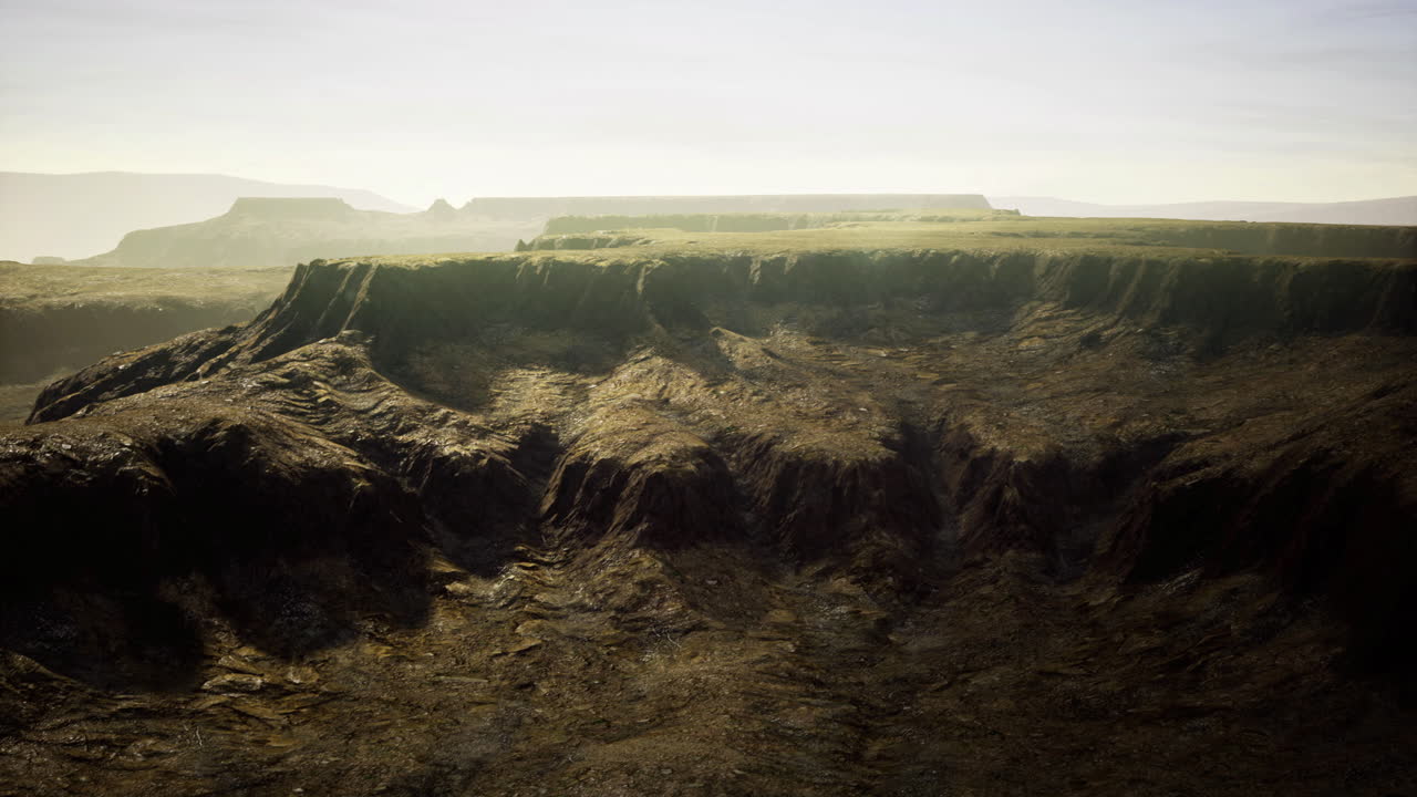 Dramatic landscape showing rocky cliffs and rugged terrain in a remote area