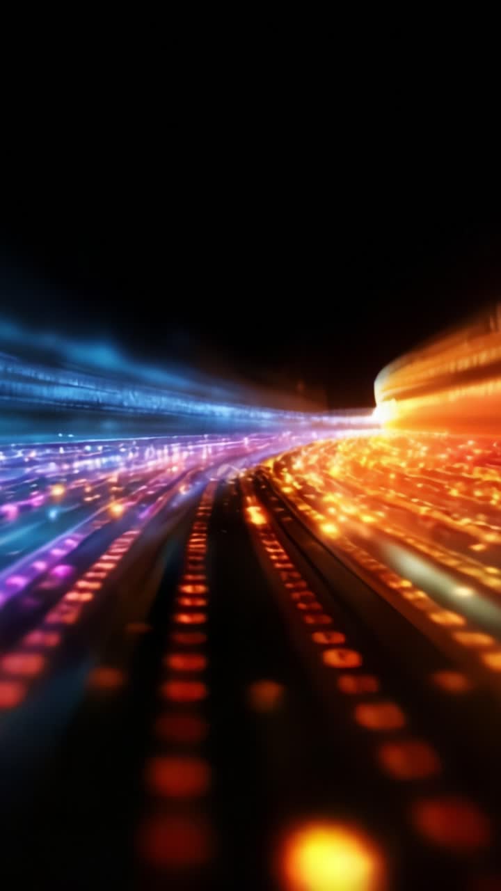 Una visualizzazione ipnotica di scie luminose colorate che si intrecciano nell'oscurità, mettendo in mostra tonalità vivaci e movimenti dinamici in una composizione astratta.